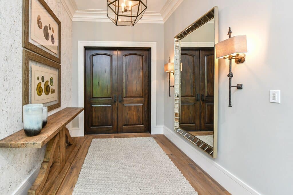 A grand entry with a natural fiber rug
